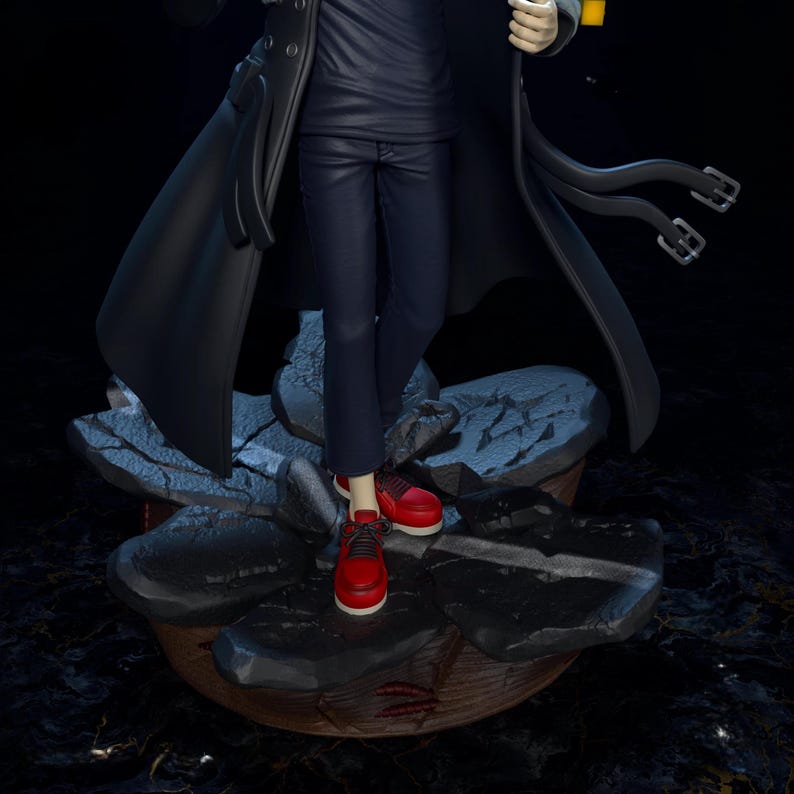 May include: A figure in a black coat, navy blue pants, and red sneakers stands on a stone-like base. The figure's outfit includes a dark blue shirt. The base has a flower-like shape with dark gray stone elements.