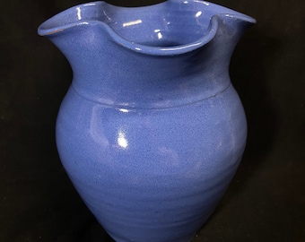 Large Bybee or Waco ruffled top blue vase.