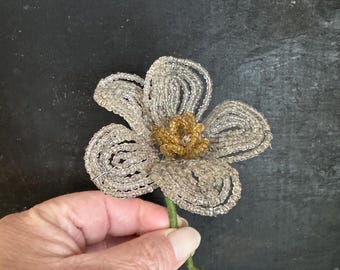 Vintage stem of beaded flower