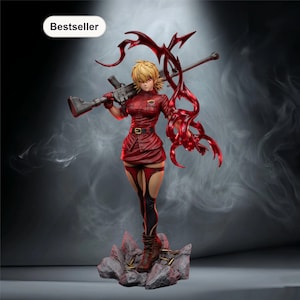 May include: A red figurine of a female character holding a rifle and a red, claw-like appendage. The figure wears a red uniform with a belt, black and red leggings, and brown boots. The base is a rocky structure. The word "Bestseller" is in a white oval.