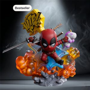 May include: A Deadpool figurine in a dynamic pose, wielding a sword and holding a unicorn. The figure is red and black, with a yellow "WTF!" sign. The base features flames and a blue cape, with an arrow and smoke effects.