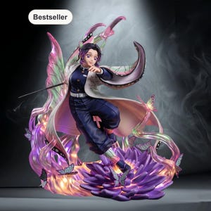 May include: A detailed figurine of a character from an anime series, featuring a woman in a dark blue uniform with a white coat. The figure is surrounded by purple and pink floral elements and butterflies, with a "Bestseller" label.