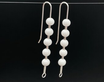 stacked minimal glass earrings .  long white dangle earrings .  super simple French hooks . Gift for the minimalist . fresh clean design