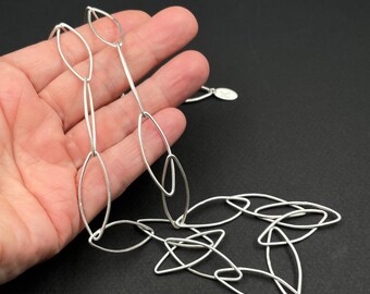 hand hammered silver OVAL chain LINK necklace .  30" necklace refined and slightly industrial