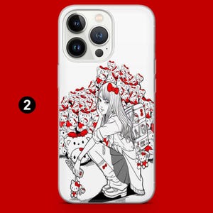 May include: White phone case featuring a black and white manga-style illustration. The design includes a girl with long hair, a red bow, and a pile of Hello Kitty plushies. The number "2" is in the upper left corner.