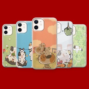 May include: Five clear smartphone cases featuring illustrated guinea pigs in various scenes: one with flowers, one with laundry, one on a playground spring rider, one with a hanging bell pepper, and one with a background of green clover leaves.