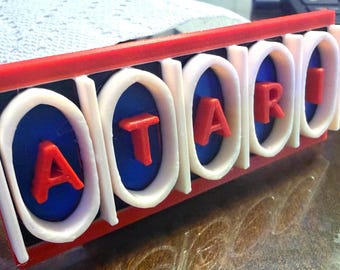 Originally-Designed Atari-Themed Display with option for magnet format. Can you find the ‘hidden’ Atari logo(s)?!