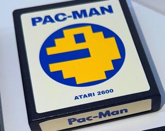 Vintage Pac-Man cartridge for Atari 2600 with modernized original labels.