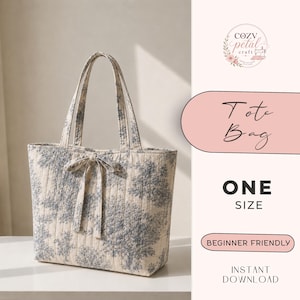 May include: A quilted tote bag featuring a blue and cream toile de jouy pattern with a decorative bow tie at the center. The text on the right reads Cozv Petal Craft, Tote Bag, ONE SIZE, BEGINNER FRIENDLY, and INSTANT DOWNLOAD.