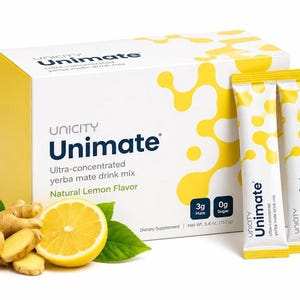 May include: A white and yellow box of Unimate ultra-concentrated yerba mate drink mix with natural lemon flavor, net weight 5.4 oz, alongside two matching single-serve packets, a sliced lemon, and fresh ginger root on a white background.