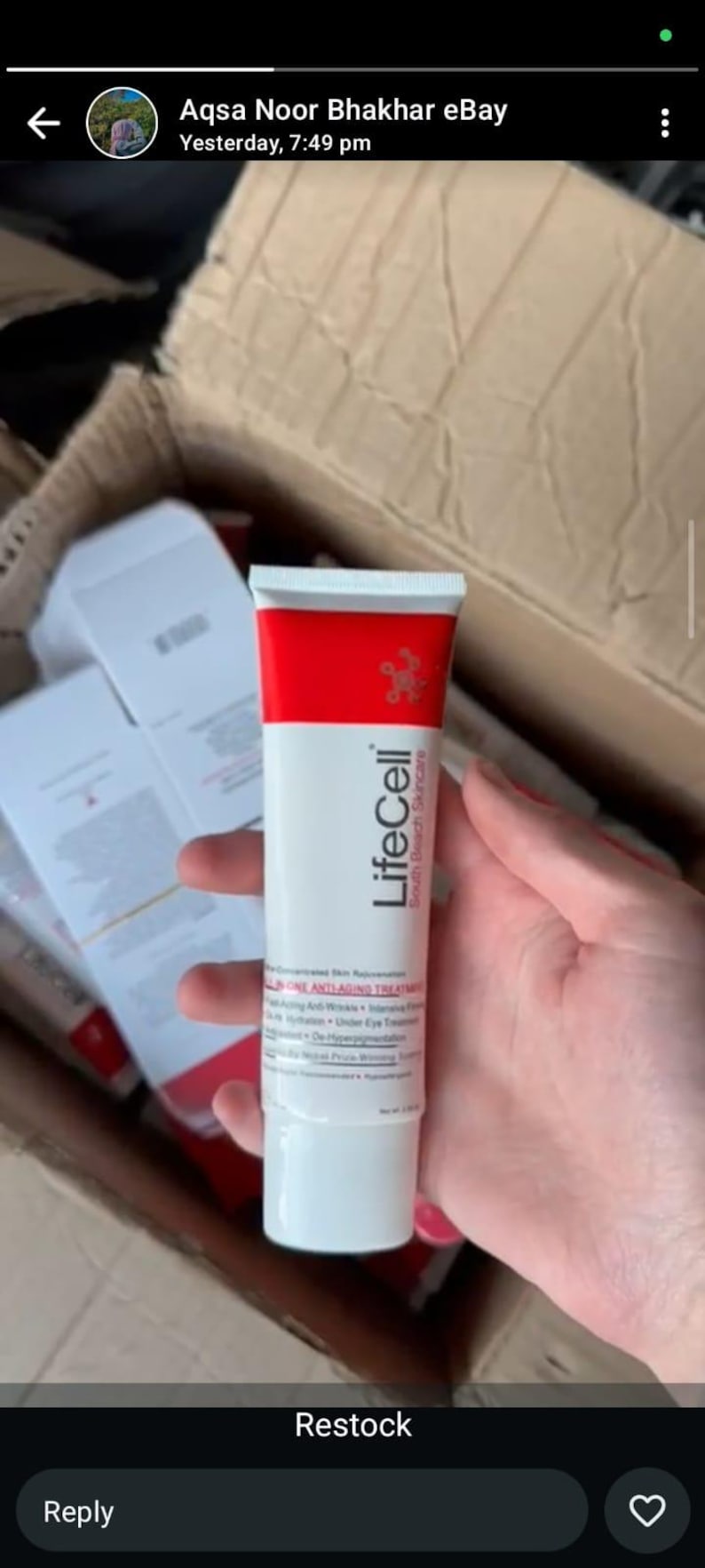 May include: A white and red squeeze tube of LifeCell South Beach Skincare All-In-One Anti-Aging Treatment. The tube features a red band at the top, the brand name LifeCell, and text detailing its use as an anti-wrinkle and firming treatment.