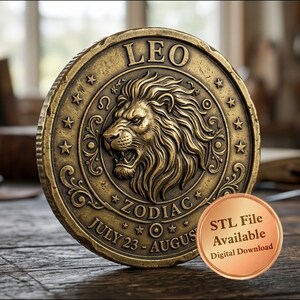 May include: A circular bronze-toned medallion featuring a relief of a lion head in the centre, surrounded by the text LEO and ZODIAC, with the dates JULY 23 - AUGUST 22. A small copper-coloured circular badge displays the text STL File Available Digital Download.