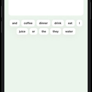 May include: A smartphone screen displaying a language learning application interface. The screen shows the text Je bois et mange, a speaker icon, a blank input field, and a grid of word tiles including and, coffee, dinner, drink, eat, I, juice, or, the, they, water.
