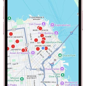May include: A smartphone screen displaying a digital map of San Francisco with various red circular location markers, green park icons, and purple landmark icons. The interface includes navigation tabs at the bottom labeled Home, Prayers, Calendar, Churches, and Settings.