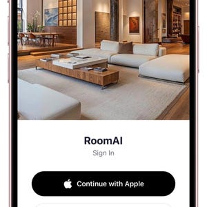 Pu&ograve; includere: Uno schermo di smartphone che mostra la pagina di accesso di RoomAI. L'interfaccia presenta una grande immagine di un soggiorno moderno, il testo RoomAI, Sign In e due pulsanti etichettati come Continue with Apple e Continue with Google.