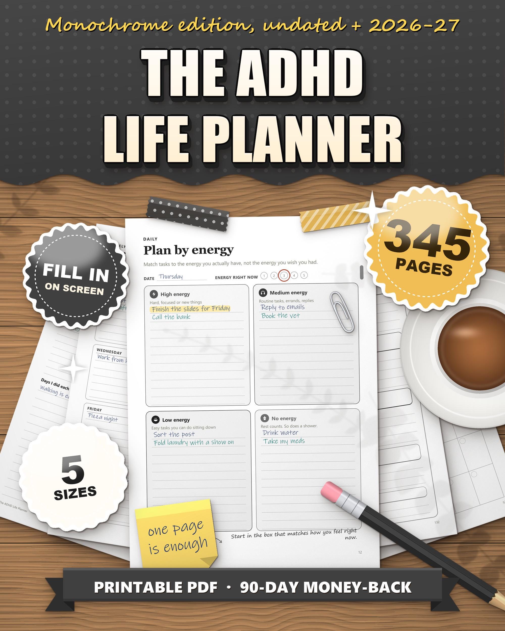 The ADHD Life Planner monochrome edition 2026 2027 printable, plan by energy daily page in black and white on a desk, 345 pages, 5 sizes, fill in on screen