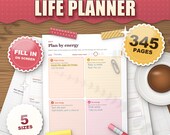 The ADHD Life Planner sunset edition 2026 2027 printable, plan by energy daily page in warm sunset colours on a desk, 345 pages, 5 sizes, fill in on screen