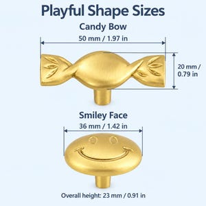 May include: Two gold-toned metal cabinet knobs labeled Playful Shape Sizes. The Candy Bow knob measures 1.97 inches wide by 0.79 inches high. The Smiley Face knob measures 1.42 inches wide. Both knobs have an overall height of 0.91 inches.