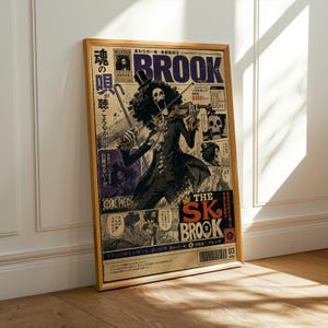 May include: Wooden framed poster with a vintage comic book style featuring a skeletal figure playing a violin. The poster has Japanese text and illustrations, with the name "BROOK" and the words "ONE PIECE" visible. The overall colour scheme is brown and purple.