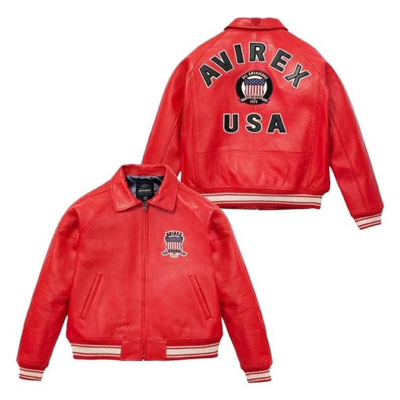 May include: A red leather jacket with a zip-up front and a white and red striped hem. The jacket features the text "AVIREX" and "USA" with an emblem on the back and front. The jacket is a classic bomber style.