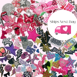 May include: A collection of colorful iron-on patches featuring various designs, including stars, hearts, checkered patterns, and words like "boujee", "girl gang", "angel baby", "expensive", "yeah no", and "salty".