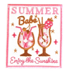 May include: Embroidered patch with a pink border featuring the words "SUMMER Babe Enjoy the Sunshine." Two cocktail glasses are depicted, one with a cherry and the other with a strawberry. Gold stars and pink diamonds surround the glasses.