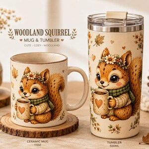 May include: A ceramic mug and a stainless steel tumbler featuring a woodland squirrel illustration. The mug is labeled 11oz and the tumbler 500ml. Both items display a squirrel wearing a flower crown and green scarf, holding a heart-patterned mug.