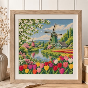 Könnte beinhalten: Ein quadratischer gerahmter Kunstdruck mit einer Landschaftsmalerei einer niederländischen Szenerie mit einer grünen Windmühle, einem kleinen Haus, einem gewundenen Fluss und einem lebendigen Vordergrund voller roter, gelber, rosa und weißer Tulpen.