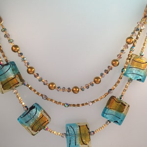 Handmade three tiered glass beaded necklace