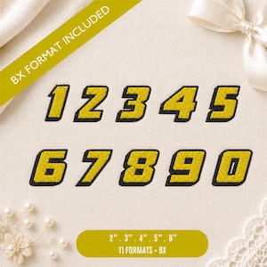 May include: A set of embroidered numbers from 0 to 9 in a bold, slanted yellow font with black outlines. The text BX FORMAT INCLUDED appears in a yellow banner, and a lower banner lists sizes 2, 3, 4, 5, and 6 inches with 11 formats plus BX.