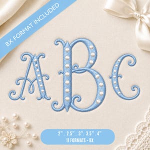 May include: An embroidery design featuring the letters A, B, and C in a light blue thread with white dot accents. A blue diagonal banner displays the text BX FORMAT INCLUDED, and a blue bottom banner lists sizes 2, 2.5, 3, 3.5, and 4 inches.