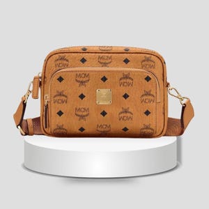 Borsa a tracolla piccola MCM Aren in pelle, vera pelle bovina color cognac, elegante e alla moda