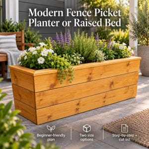 May include: A rectangular wooden planter box with three horizontal planks, filled with white flowers and purple lupines. Text reads: Modern Fence Picket Planter or Raised Bed, Beginner-friendly plan, Two size options, Step-by-step + cut list.