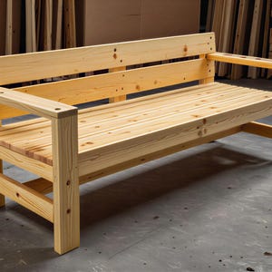 May include: A light-colored natural wood bench featuring a slatted seat, a high backrest with two horizontal planks, and sturdy square armrests. The construction displays visible wood grain patterns and circular joinery details on the frame.