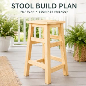 May include: A light-colored wooden stool with a square seat and four legs connected by horizontal support bars. The text STOOL BUILD PLAN PDF PLAN • BEGINNER FRIENDLY is displayed at the top of the image in dark lettering.