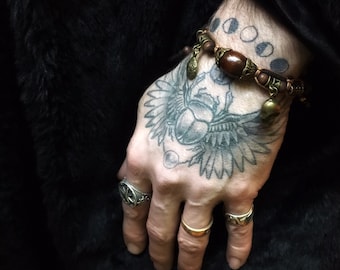 Pirate's Booty Bracelet: Bronze Charms & Brown Wood Beading - Adjustable