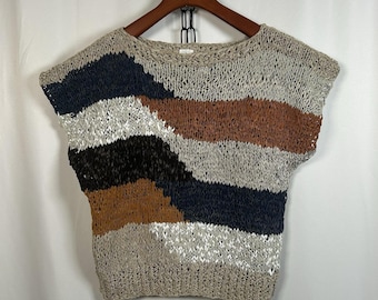 Jersey de piel de cordero tejido, raro, de los años 70. Talla S/M: 57 cm x 53 cm x 47 cm.