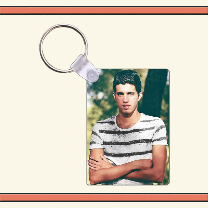 1.6 x 2.25 Inch Aluminum Keychain Lesbians eat what!