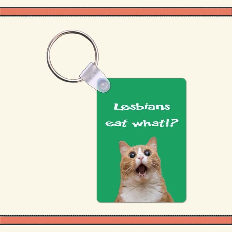 1.6 x 2.25 Inch Aluminum Keychain Lesbians eat what!