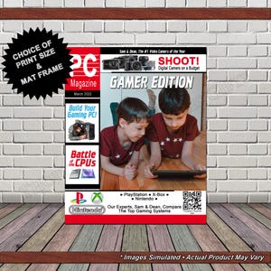 May include: A framed PC Magazine cover, Gamer Edition, March 2022. The cover features two children playing a game. Text includes "Build Your Gaming PC!" and "Battle of the CPUs." Logos for PlayStation, X-Box, and Nintendo are visible.