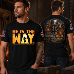 May include: Black t-shirt with the text "HE IS THE WAY" in orange and yellow, featuring a silhouette of a person. The back of the shirt displays a helmet design with the text "FORGED BY FIRE ARMORED BY GOD SENT FOR HIS GLORY".