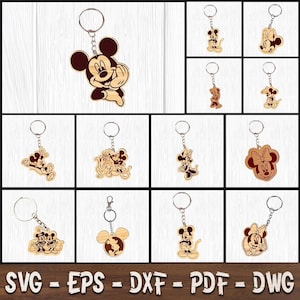 May include: A collection of wooden keychains featuring various engraved cartoon mouse characters, including Mickey and Minnie Mouse in different poses, each attached to a silver-coloured metal split ring. The text SVG - EPS - DXF - PDF - DWG is visible.