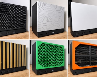 May include: A collection of six computer cases featuring interchangeable front panels in various designs including black honeycomb, silver topographic lines, solid white, vertical gold slats, green geometric lattice, and orange with a black mesh.