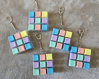 Llavero antiestrés de 9 teclas con clic, diseño pastel, ideal como adorno para bolso o para aliviar el estrés.