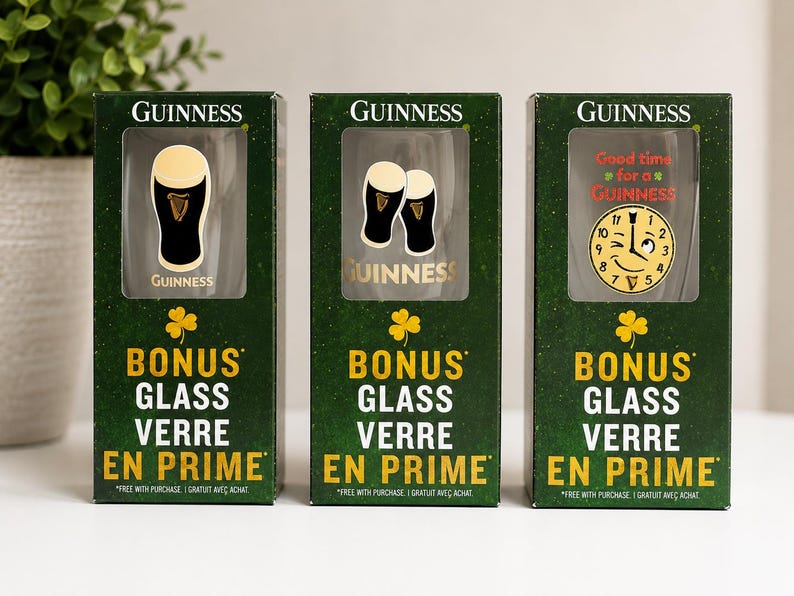 May include: Three Guinness bonus glass boxes. Each box is dark green with gold lettering and a shamrock. The boxes feature images of Guinness glasses and a clock with the text "Good time for a Guinness".