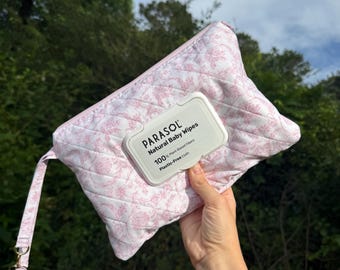 Bolsita/muñequera acolchada hecha a mano para toallitas y pañales