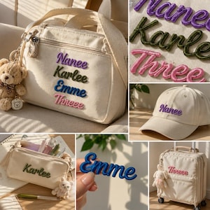 May include: A cream-colored canvas bag, pencil case, baseball cap, and rolling suitcase, each featuring embroidered names in purple, green, blue, or pink. The items include a small plush bear keychain and cursive text reading Nanee, Karlee, Emme, and Threee.