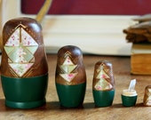 modern matryoshka nesting dolls in emerald green, unique home decor, four floral and geometric dolls with quartz crystal