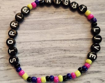 Storrie Night Live bracelet SNL host