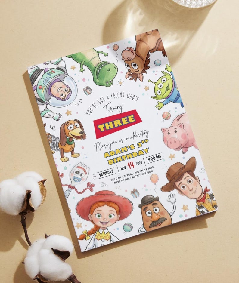 May include: A rectangular birthday invitation card featuring colorful cartoon illustrations of various toy characters. The text reads: You've got a friend who's turning three. Please join us in celebrating Adam's 3rd birthday, Saturday, Nov 14, 2026, 2:00 PM.